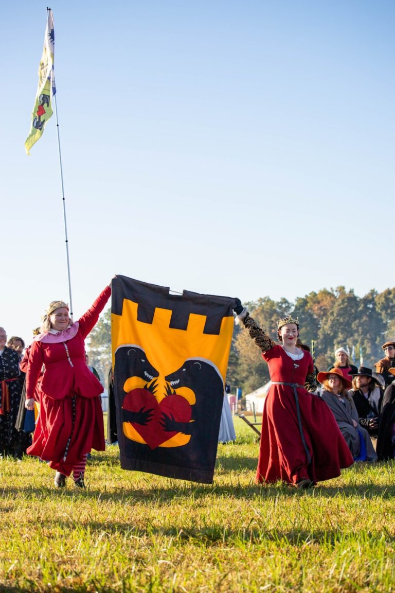 Members of House Honey Badger displaying their heraldry