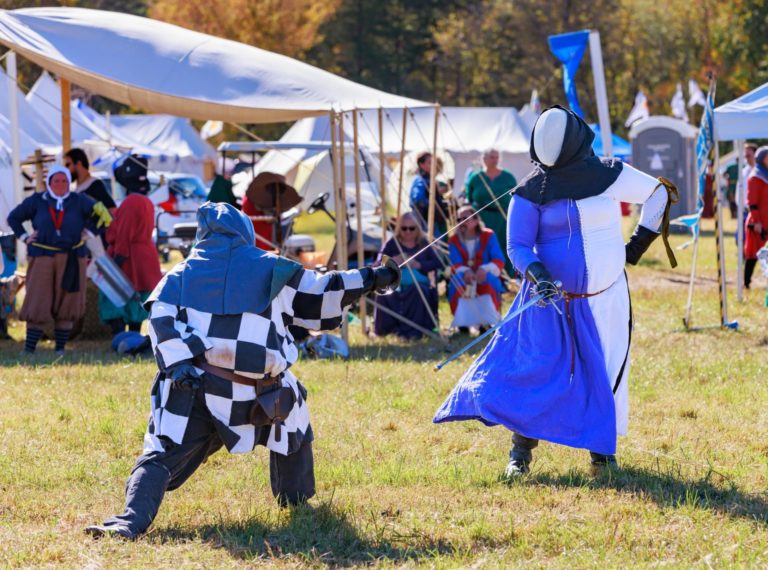 Two rapier fighters, engaged in combat