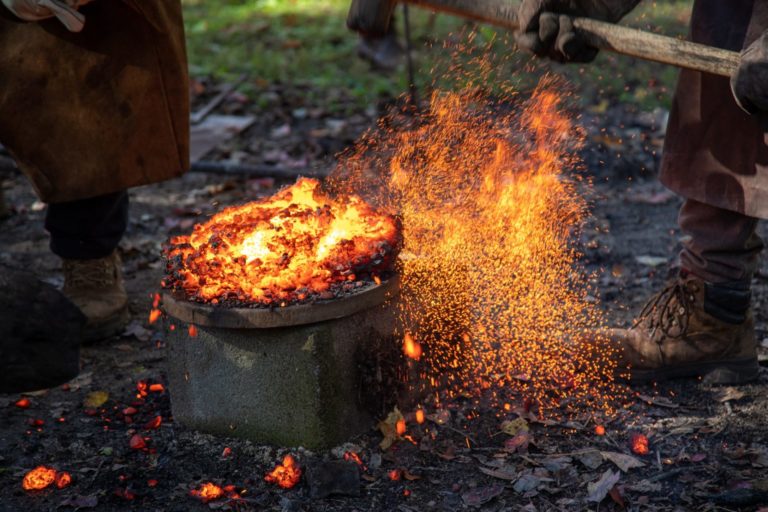 Glowing hot metal being worked